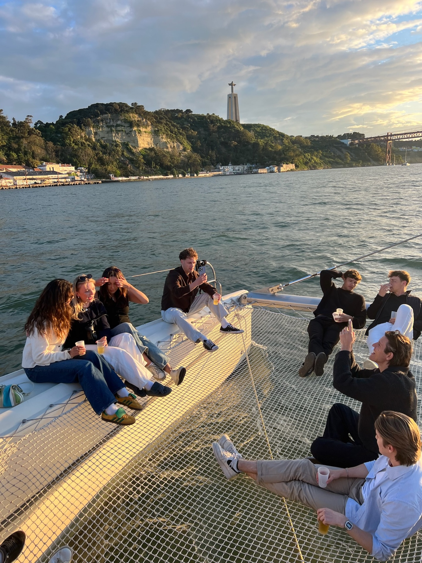 Members on a sunset boat trip on the Tagus